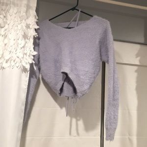 Cropped baby blue sweater with detail back